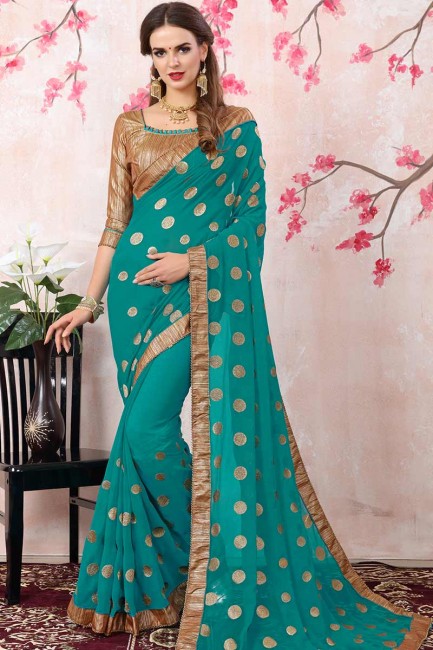 Fascinating Turquoise Blue color Georgette saree