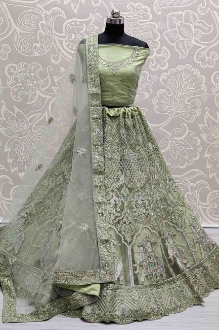 Embroidered Wedding Wear Lehenga Choli in Green Net
