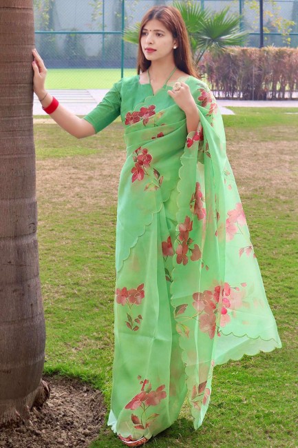 Printed Silk and organza Saree in Green