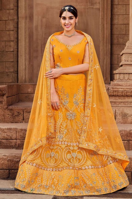 Lehenga Choli in Mustard  Soft net with Embroidered