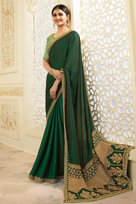 Dark Green color Silk Saree