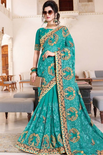 Embroidered Saree in Turquoise Blue Georgette