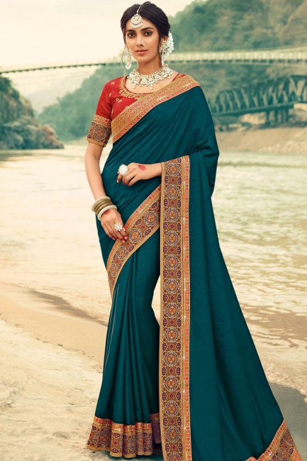 Jacquard & Silk Saree in Teal Blue with Embroidered