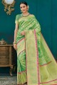 Glorious Banarasi raw silk Banarasi Saree in Green