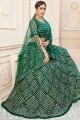 Luring Net Lehenga Choli in Green with Embroidery