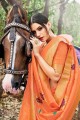 Impressive Orange Banarasi Saree in Weaving Banarasi raw Silk