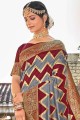 Enticing Maroon Banarasi raw Silk Banarasi Saree with Weaving