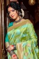 Ravishing Weaving Banarasi raw Silk Banarasi Saree in Green