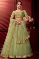 Net and satin Party Lehenga Choli in Light pista green with Embroidered