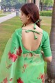 Printed Silk and organza Saree in Green