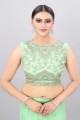 Embroidered Net Party Lehenga Choli in Green with Dupatta