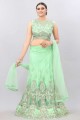 Embroidered Net Party Lehenga Choli in Green with Dupatta