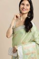 Resham,embroidered,lace border Saree in Light green Linen