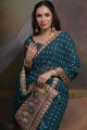 Sequins,printed,lace border Georgette Saree in Teal blue