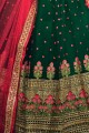 Dark Green Lehenga Choli in Net with Embroidery