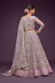 Wedding Lehenga Choli in Dusky orchid Soft net with Embroidered