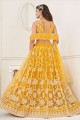 Yellow Wedding Lehenga Choli in Embroidered Net