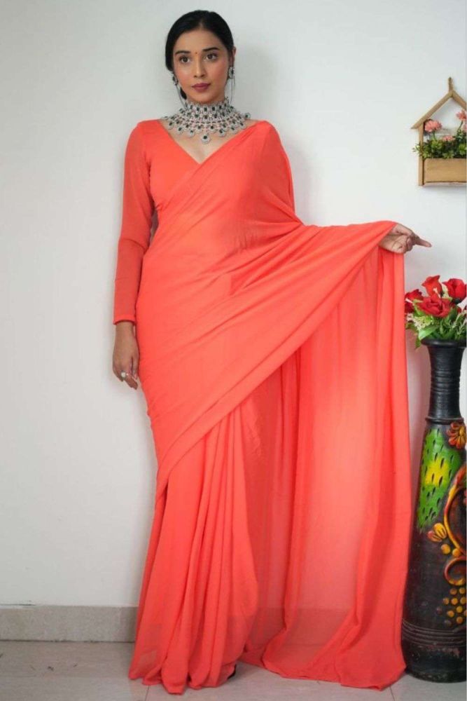 Plain orange saree with designer blouse deals