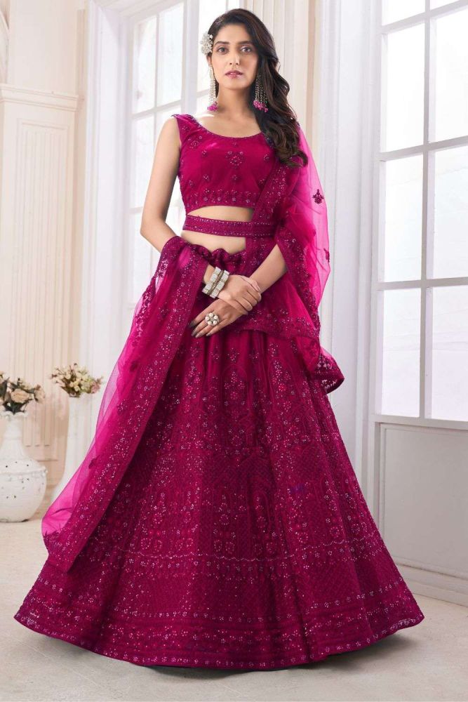 Wedding Lehenga Choli in Rani pink Soft net with Zircon