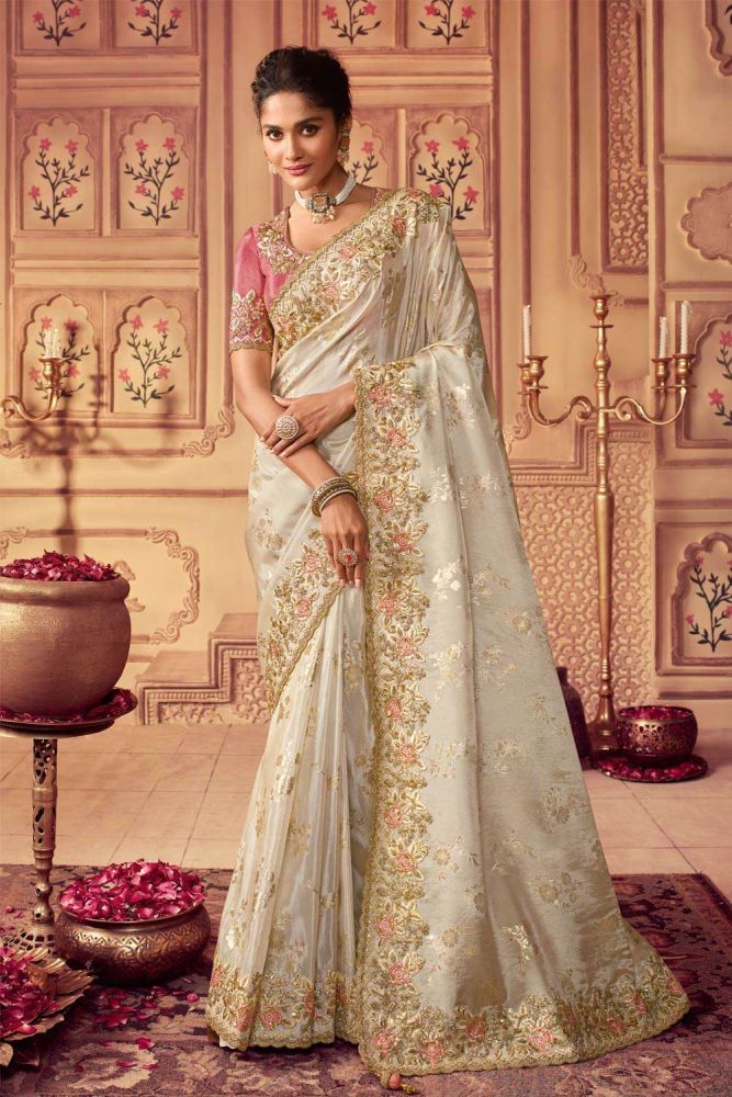 Off white saree with pink blouse hotsell